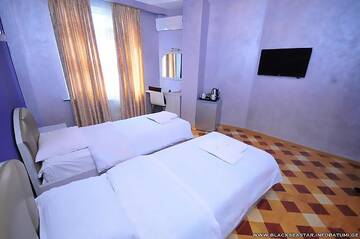 Фото номера Двухместный номер с 2 отдельными кроватями Отель Black Sea Star Batumi г. Батуми 4