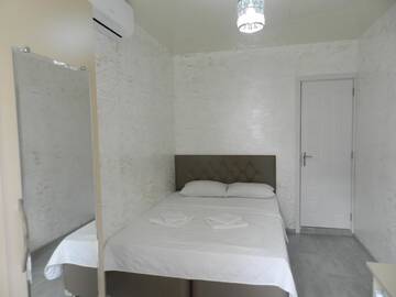 Фото номера Двухуровневый номер-студио Гостевой дом Nia Guest House г. Батуми 8