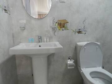 Фото номера Двухместный номер-студио Делюкс с 1 кроватью Гостевой дом Nia Guest House г. Батуми 6