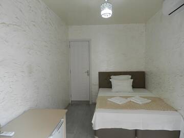 Фото номера Двухместный номер-студио Делюкс с 1 кроватью Гостевой дом Nia Guest House г. Батуми 7