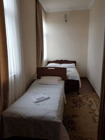 Фото номера Трехместный номер с душем Гостевой дом Nia Guest House г. Батуми 4