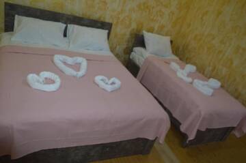 Фото номера Улучшенный трехместный номер Отель Hotel Buta г. Батуми 5