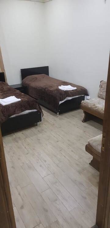 Фото номера Стандартный двухместный номер с 2 отдельными кроватями Отель Hotel Cattaleya г. Батуми 5