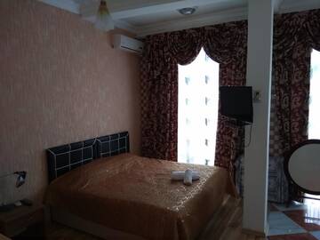 Фото номера Трехместный номер с ванной Гостевой дом Mozoji г. Батуми 4