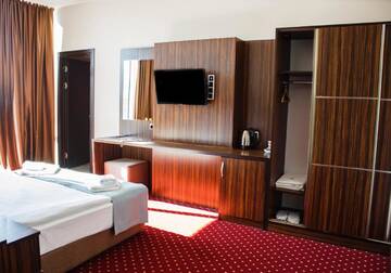 Фото номера Стандартный двухместный номер с 1 кроватью Отель Legend Business Hotel Batumi г. Батуми 4