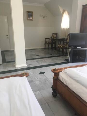 Фото номера Четырехместный номер с балконом Отель Richeuli Villa г. Батуми 8