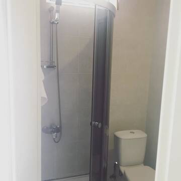 Фото номера Двухместный номер с 2 отдельными кроватями и балконом Отель Richeuli Villa г. Батуми 5