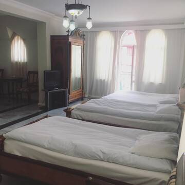 Фото номера Четырехместный номер с балконом Отель Richeuli Villa г. Батуми 7