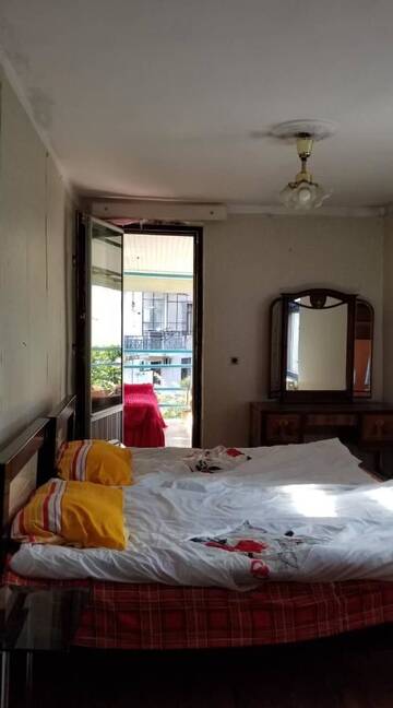 Фото номера Трехместный номер с балконом Гостевой дом Guest House ERA Square г. Батуми 4