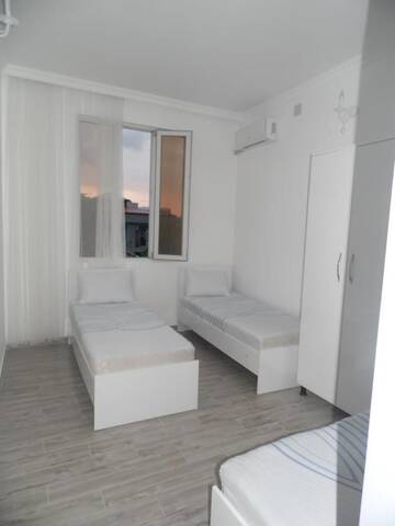 Фото номера Трехместный номер с ванной комнатой Гостевой дом Guesthouse Dago г. Батуми 3