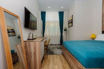 Фото номера Улучшенный двухместный номер с 1 кроватью Отель Boulevard Hotel Batumi г. Батуми 9