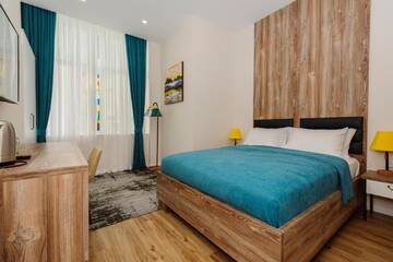 Фото номера Улучшенный двухместный номер с 1 кроватью Отель Boulevard Hotel Batumi г. Батуми 4