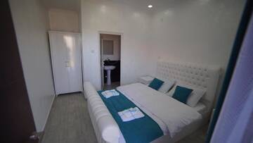 Фото номера Двухместный номер с 1 кроватью и балконом Гостевой дом Nikas Guest House г. Батуми 4