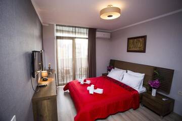 Фото номера Апартаменты с видом на бассейн Отели типа «постель и завтрак» APART HOTEL ORBI RESIDENCE г. Батуми 2