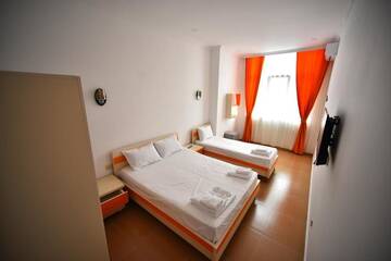 Фото номера Стандартный двухместный номер с 1 кроватью Отель Orange Home Hotel г. Батуми 10