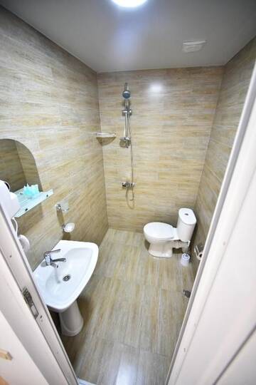 Фото номера Стандартный двухместный номер с 1 кроватью Отель Orange Home Hotel г. Батуми 22