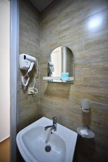 Фото номера Стандартный двухместный номер с 1 кроватью Отель Orange Home Hotel г. Батуми 21