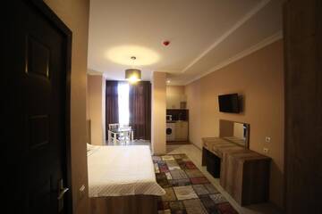 Фото номера Двухместный номер Делюкс с 1 кроватью Отель Hotel Soft г. Батуми 4