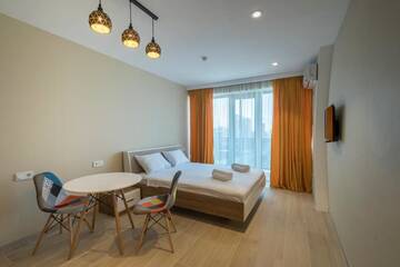 Фото номера Улучшенный двухместный номер с 1 кроватью Отель Orbi Beach Tower Hotel Official г. Батуми 27