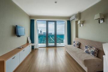 Фото номера Полулюкс с видом на море Отель Orbi Beach Tower Hotel Official г. Батуми 4