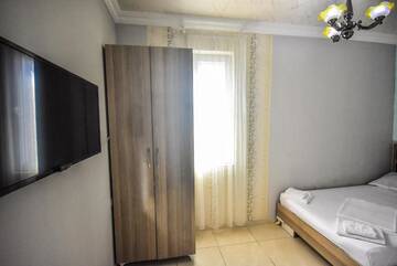 Фото номера Большой двухместный номер с 1 кроватью Отель Hotel Jms г. Батуми 11