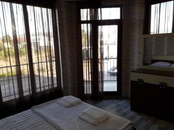 Фото номера Люкс с балконом Гостевой дом G &amp; A Guesthouse г. Батуми 10