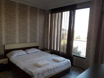 Фото номера Люкс с балконом Гостевой дом G &amp; A Guesthouse г. Батуми 11