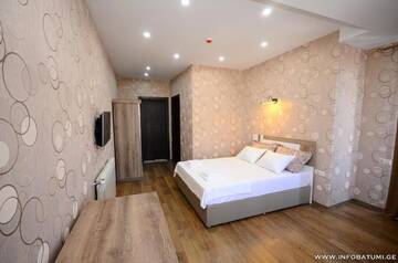 Фото номера Большой двухместный номер с 1 кроватью Отель Dream Tower г. Батуми 9