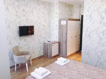 Фото номера Стандартный двухместный номер с 1 кроватью Отель Dream Tower г. Батуми 3
