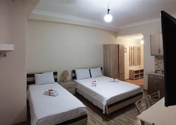 Фото номера Семейный номер Отель Hotel Tao г. Батуми 5