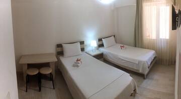 Фото номера Двухместный номер с 2 отдельными кроватями Отель Hotel Tao г. Батуми 2