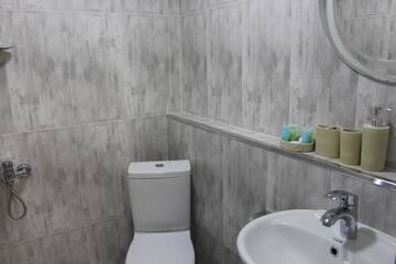 Фото номера Двухместный номер с 1 кроватью, вид на сад Гостевой дом Greenview Guesthouse г. Батуми 13