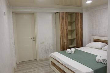 Фото номера Двухместный номер с 1 кроватью, вид на сад Гостевой дом Greenview Guesthouse г. Батуми 10