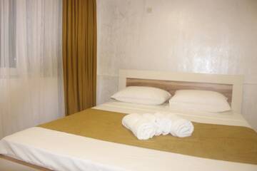 Фото номера Семейный номер с видом на сад Гостевой дом Greenview Guesthouse г. Батуми 13