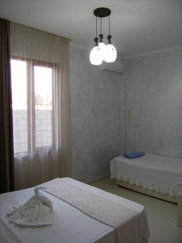 Фото номера Улучшенный трехместный номер Отель Hotel Ergo г. Батуми 28