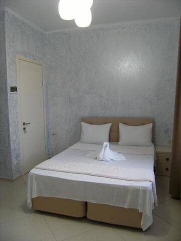 Фото номера Улучшенный трехместный номер Отель Hotel Ergo г. Батуми 32