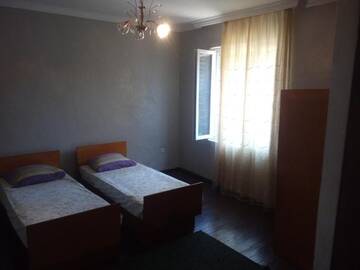 Фото номера Cемейный номер с собственной ванной комнатой Гостевой дом GuestHouse Tazo г. Батуми 4