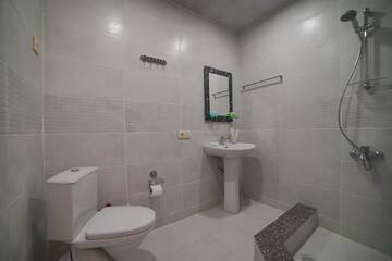 Фото номера Семейный номер с балконом Гостевой дом Guest House Holiday Village г. Батуми 2