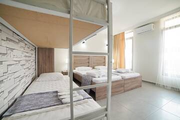 Фото номера Семейный номер с балконом Гостевой дом Guest House Holiday Village г. Батуми 13