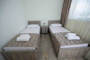 Фото номера Четырехместный номер с балконом Отель Orange Garden Hotel г. Батуми 15