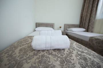 Фото номера Четырехместный номер с балконом Отель Orange Garden Hotel г. Батуми 8