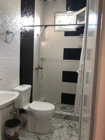 Фото номера Двухместный номер с 1 кроватью, вид на сад Гостевой дом Guesthouse Family г. Батуми 7