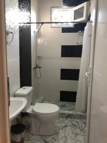 Фото номера Двухместный номер с 2 отдельными кроватями Гостевой дом Guesthouse Family г. Батуми 12