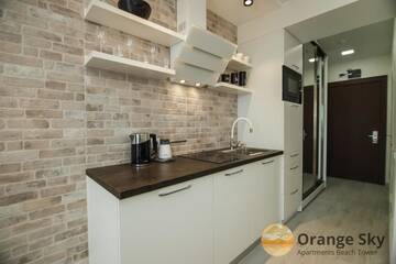 Фото номера Улучшенные апартаменты-студио с видом на море Апарт-отели Orange Sky Apartments Beach Tower г. Батуми 30