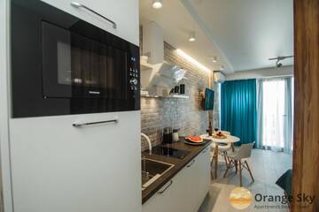 Фото номера Улучшенные апартаменты-студио с видом на море Апарт-отели Orange Sky Apartments Beach Tower г. Батуми 12