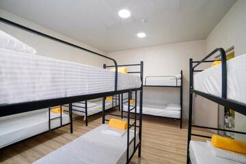Фото номера Спальное место на двухъярусной кровати в общем номере для женщин Хостелы Suncity г. Батуми 2