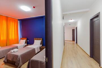 Фото номера Трехместный номер Отель Komuna Hostel &amp; Hotel г. Батуми 5