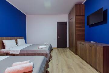 Фото номера Четырехместный номер Отель Komuna Hostel &amp; Hotel г. Батуми 6