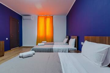 Фото номера Четырехместный номер Отель Komuna Hostel &amp; Hotel г. Батуми 4