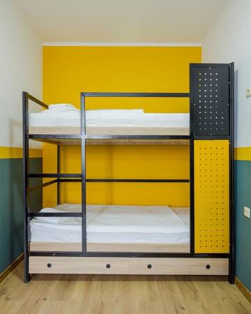 Фото номера Кровать в общем 6-местном номере для мужчин и женщин Отель Komuna Hostel &amp; Hotel г. Батуми 5